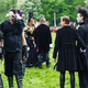 Some goths in a field, they may or may not be vampires